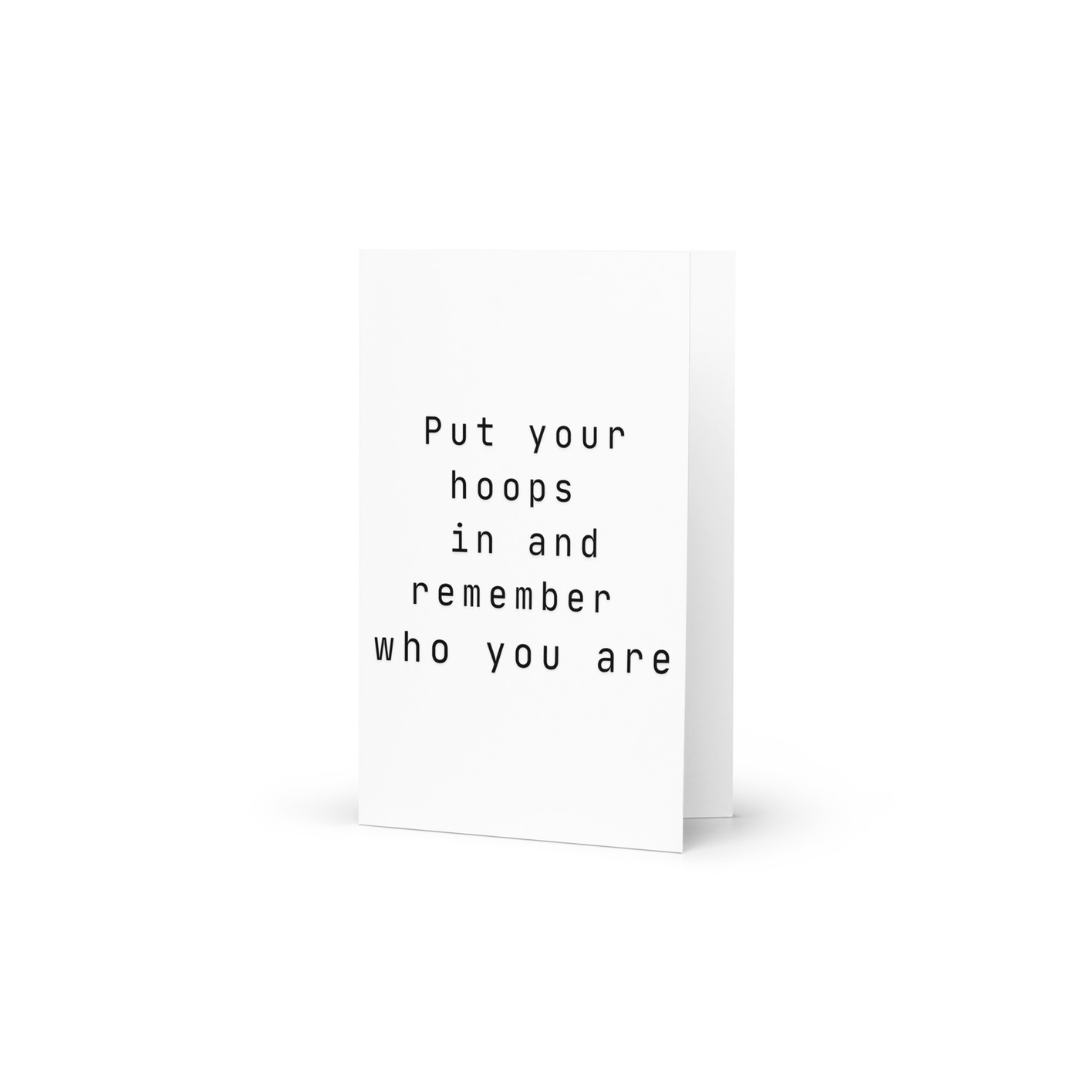 Motivational card with text 'Put your hoops in and remember who you are' on a white background.