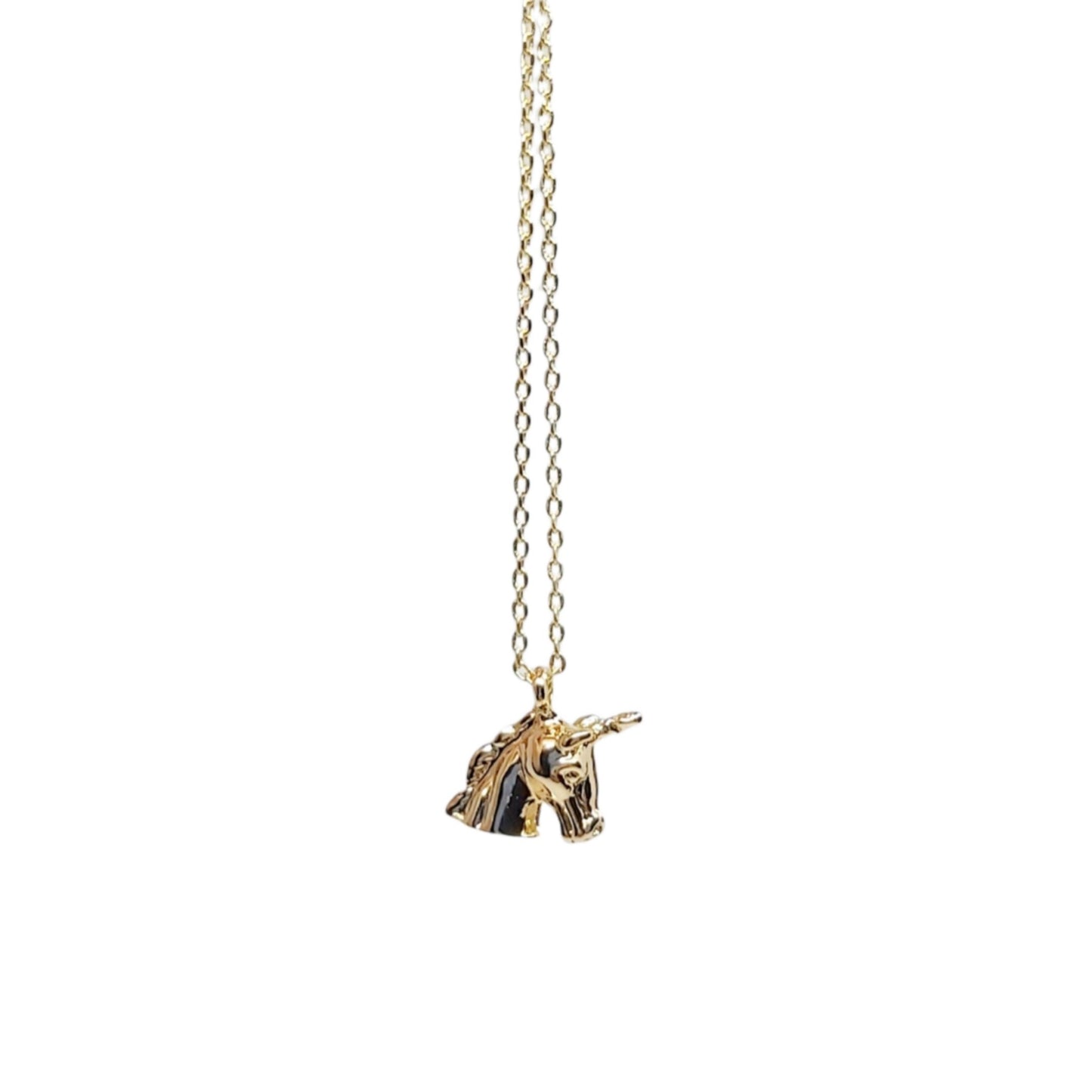 A gold plated unicorn charm dainty necklace on a white background.