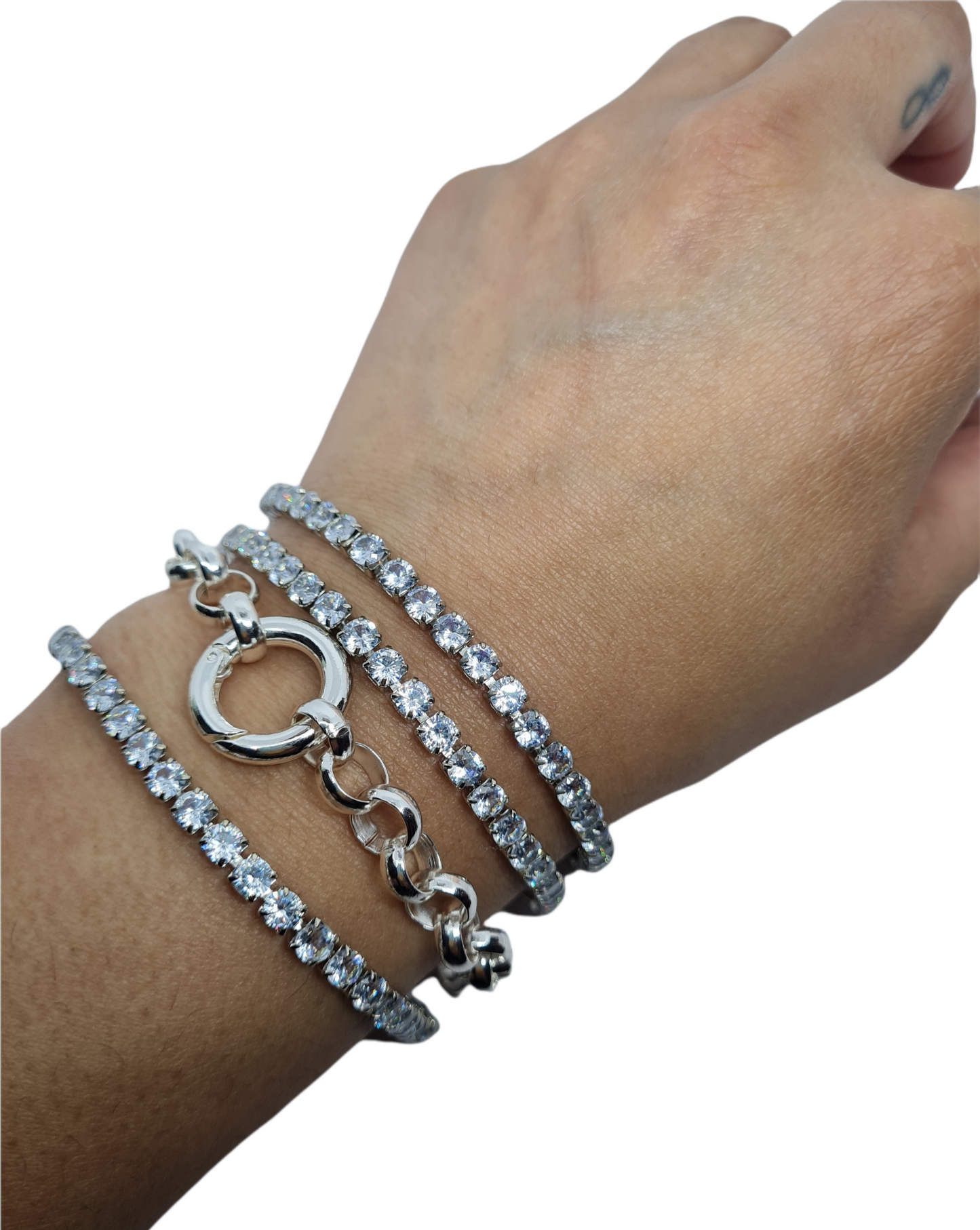 A silver-plated bracelet featuring a series of sparkling stones in a linked chain design combined with a chunky link bracelet.