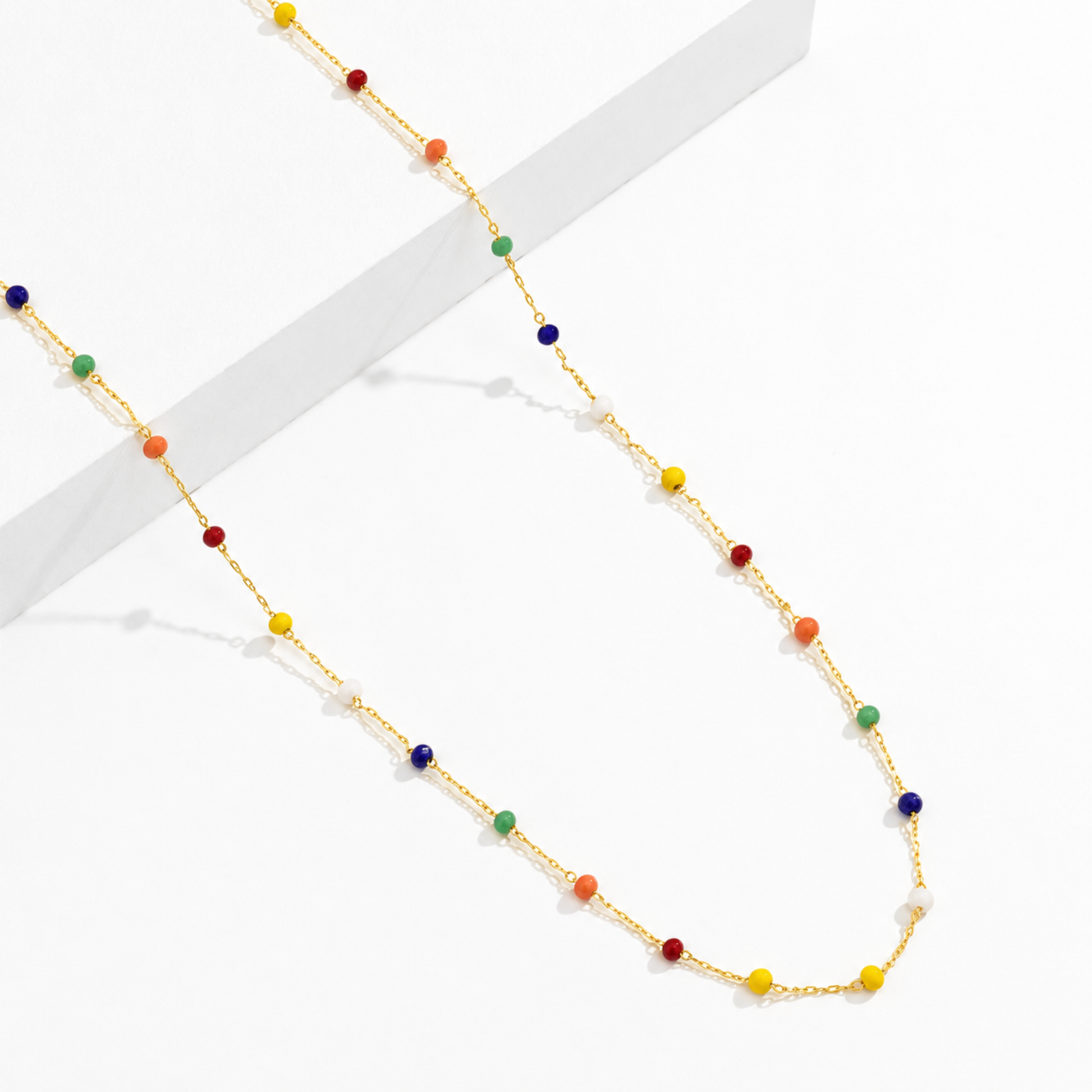 18K Gold Plated Hand Made No Tarnish Rainbow Beaded Body Chain on a white background.