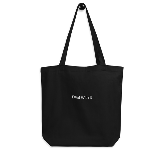 Black Deal with It Slogan embroidered eco tote bag on a blank surface.