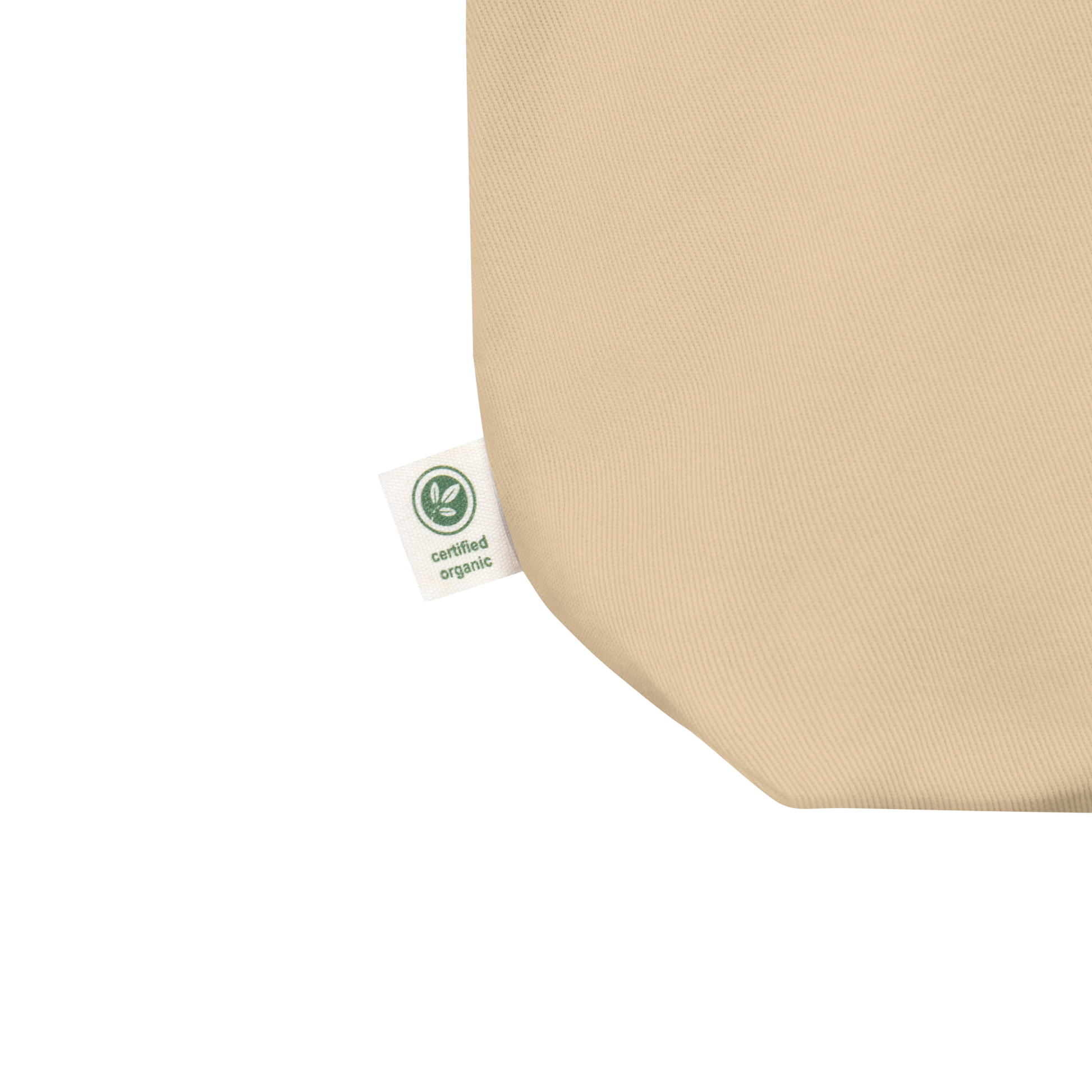 Close up of the Eco Organic cotton tote bag label on a blank surface.