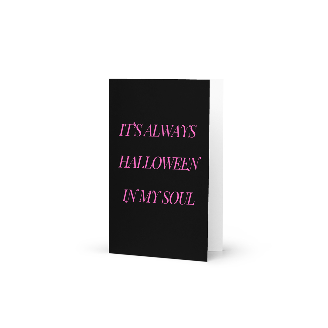 Black greeting card with pink text saying 'IT'S ALWAYS HALLOWEEN IN MY SOUL' on a white background.