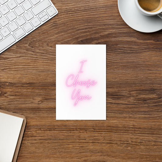 I Choose You Greeting Card on a desk by a computer, coffee and note pad.