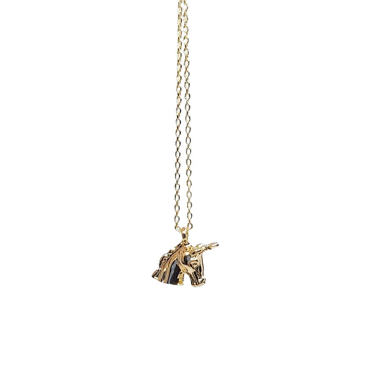 A gold plated unicorn charm dainty necklace on a white background.
