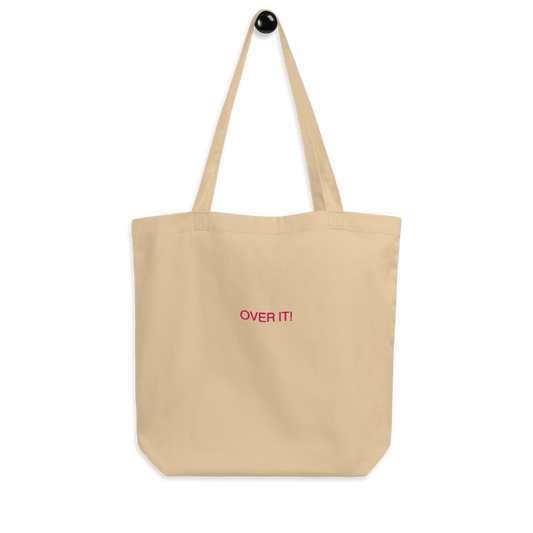 Over It slogan embroidered Eco Organic cotton tote bag on a blank surface.