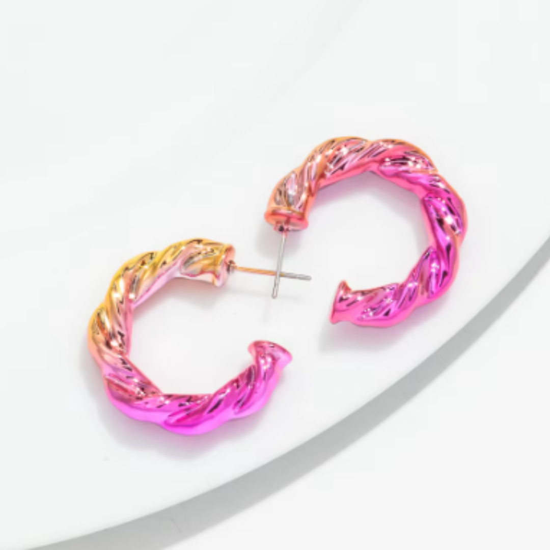 Fun neon bright acrylic hoops on a white background.