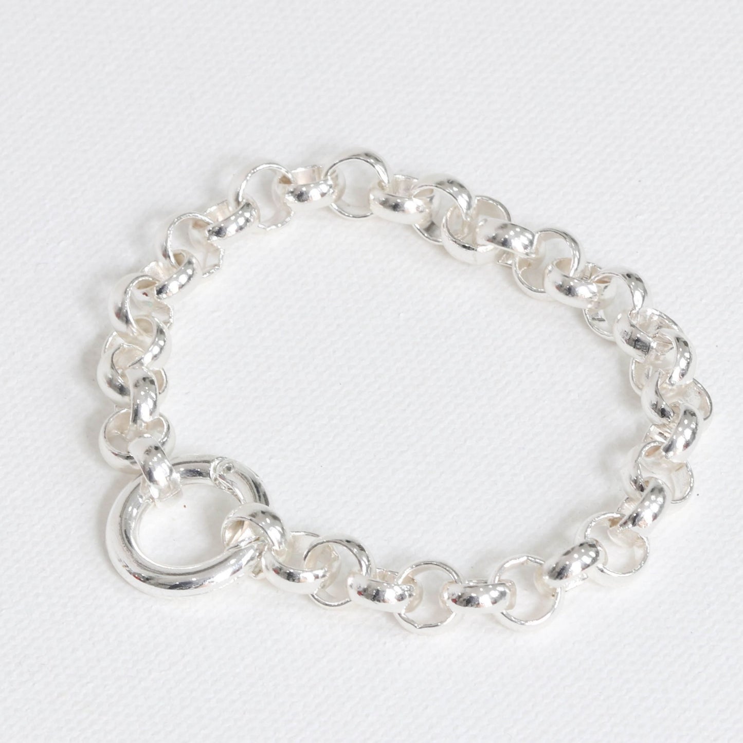 A silver-plated chunky Rollo chain bracelet on a white background.