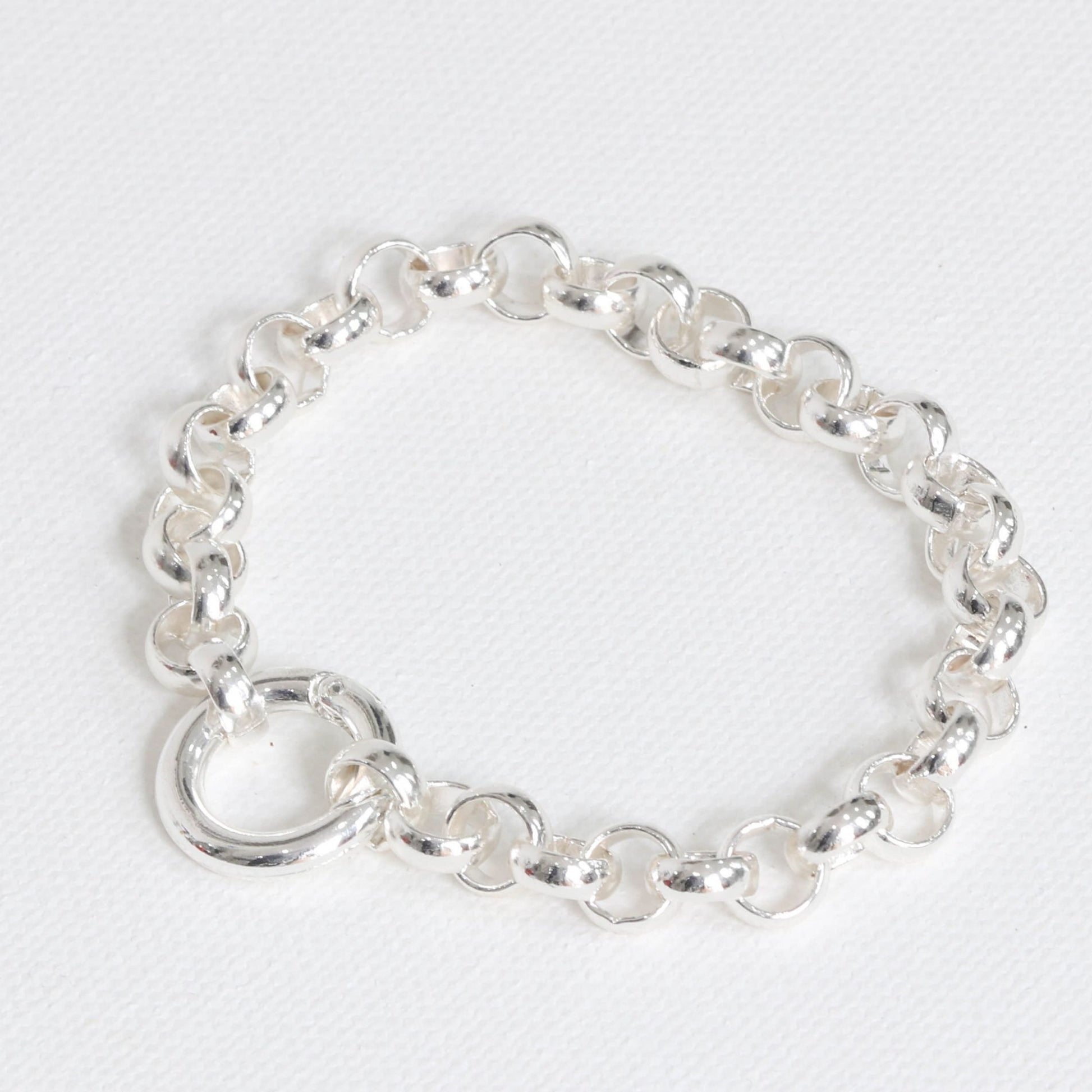 A silver-plated chunky Rollo chain bracelet on a white background.