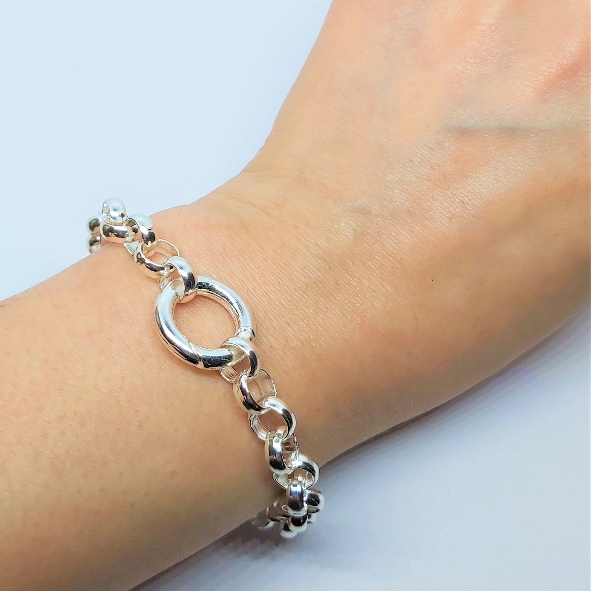 A silver-plated chunky Rollo chain bracelet on a white background.