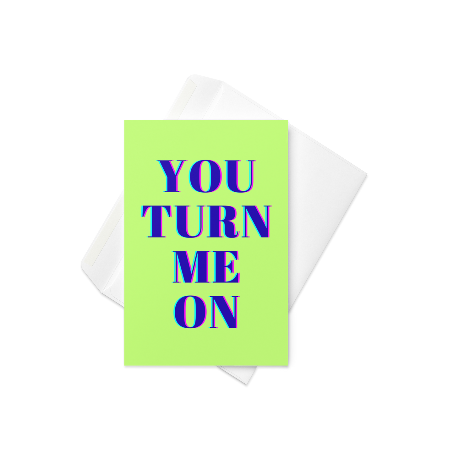 A neon green greeting card with the words You Turn Me On at the front in big bold navy letters with a white envelope also.